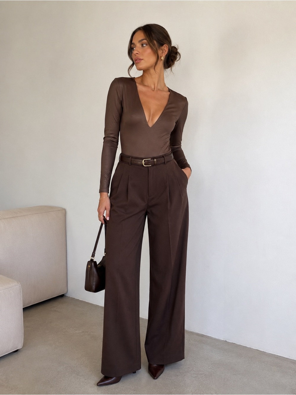 H&M long-sleeve bodysuit designed for effortless styling and layering